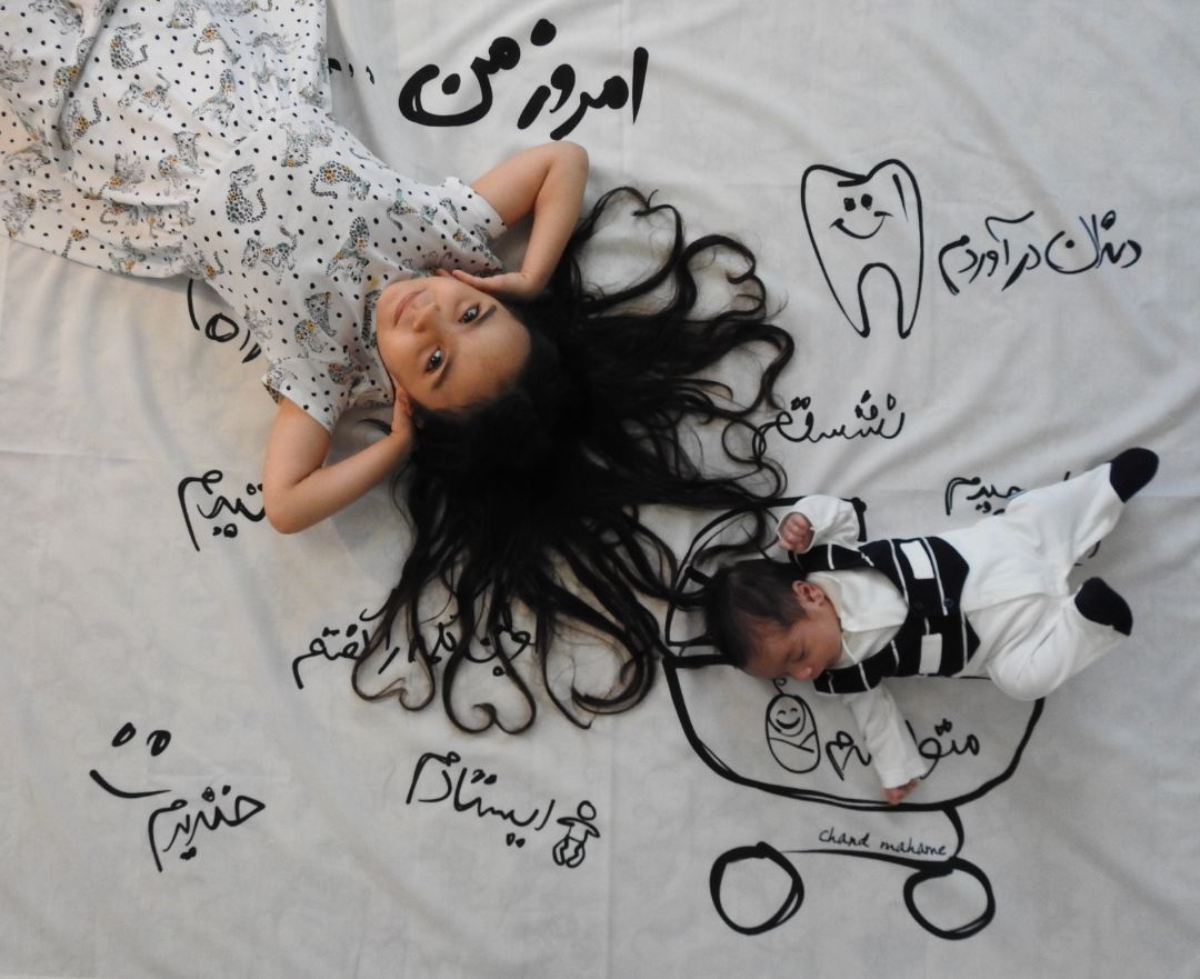 عکس نوزاد با خواهر هیراد پورعسگری