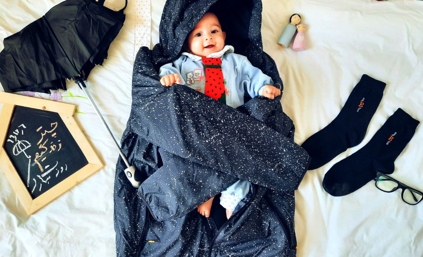 عکس نوزاد با پدر پارمیس پویان