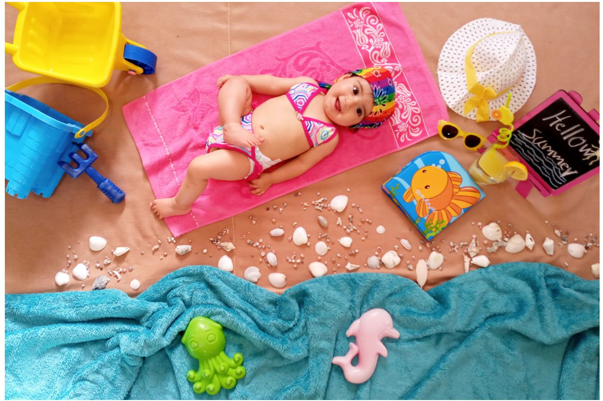 تم عکس تابستانی کودک دریا ذاکری