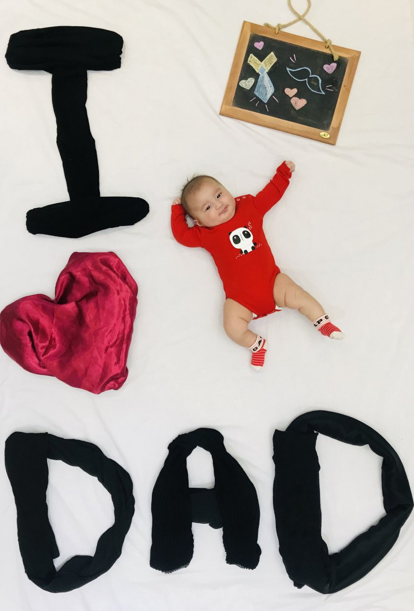 عکس نوزاد با پدر رایان فلاحتکار