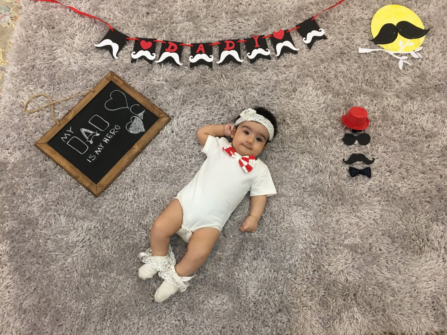 عکس نوزاد با پدر دلوین قلی نژاد